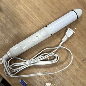 White and pink two in one iron